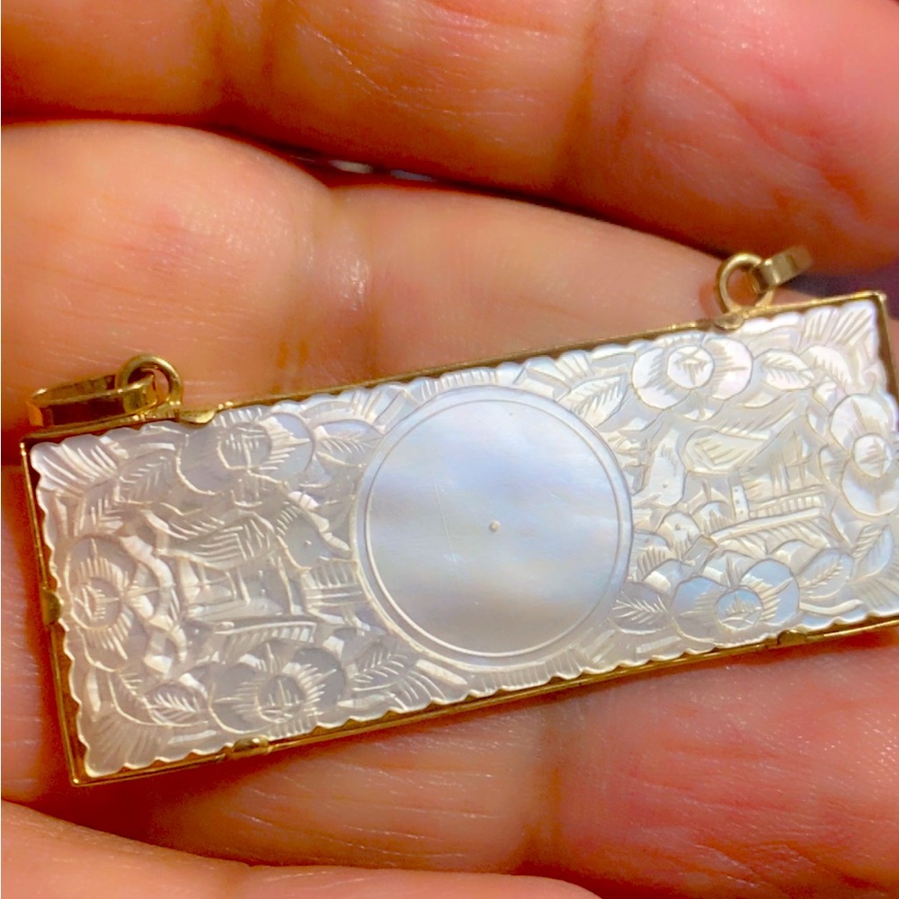 14k gold carved mother of pearl pendant